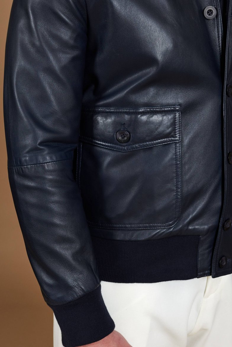 Dunkel blaue bomber lederjacke mit...