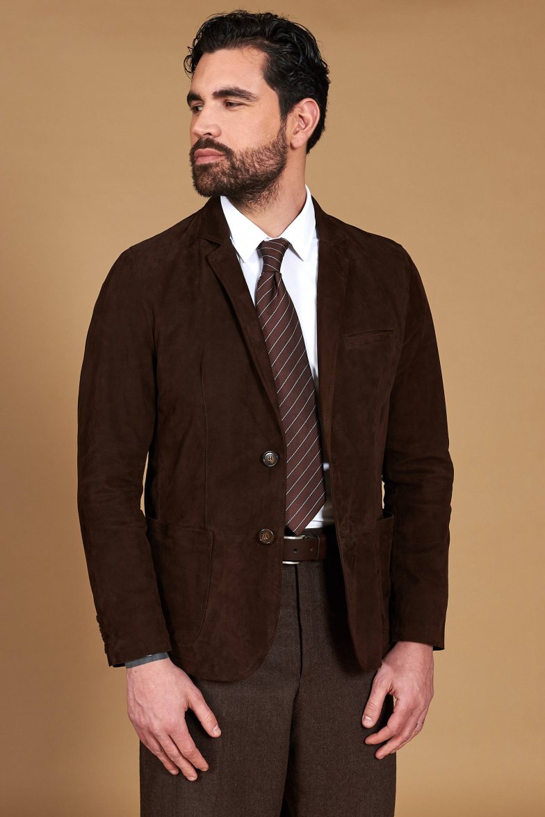 Braune blazer aus wildleder mit zwei...
