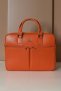 Borsa Ventiquattrore in pelle di vitello arancio saffiano doppia tasca
